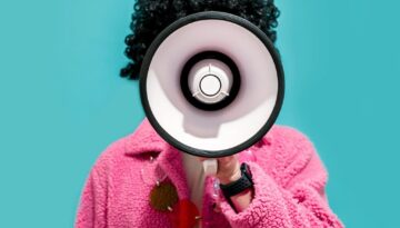 Funny portrait of an emotional guy with a megaphone. Collage in magazine style. Flyer with trendy colors, advertising copy space. Discount, sale season. Information concept. Attention news!