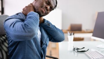 Man With Bad Posture And Ergonomics